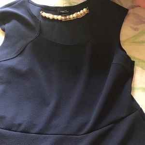 A Rue 21 navy blue dress with a necklace